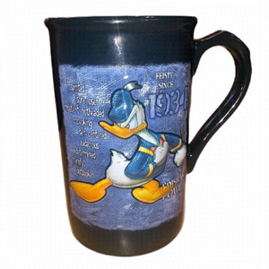 Donald Duck mug. Disney. Feisty since 1934. Blue. 5.5” tall